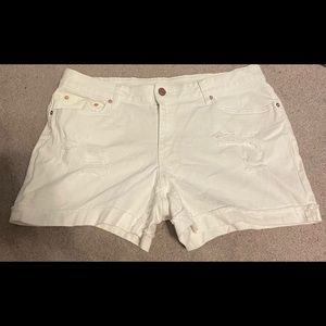 white jean shorts w/ small multiple rips in front